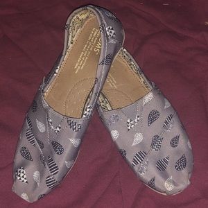 Toms,  “Singing in the Rain” slip on canvas shoes.